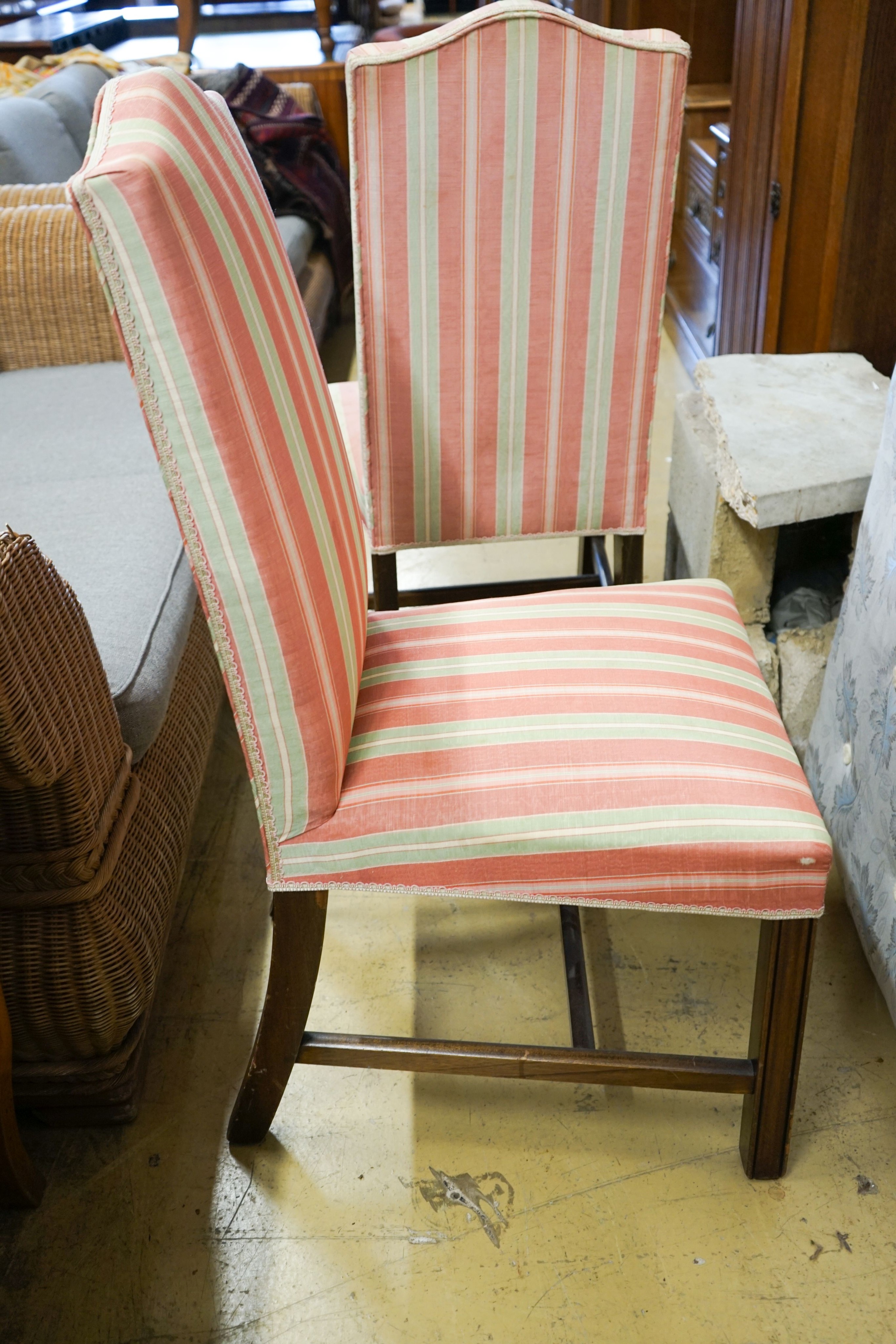 A set of fourteen reproduction George III upholstered dining chairs, width 54cm, height 110cm